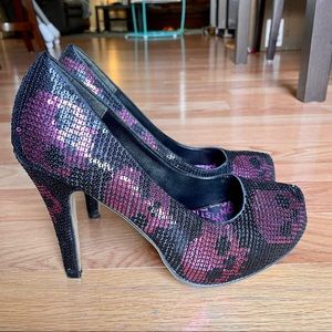 Black and hot pink sequin skulls pumps by Iron Fist